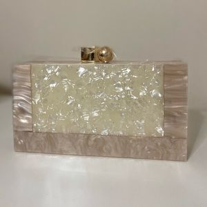 White/pearl acrylic clutch